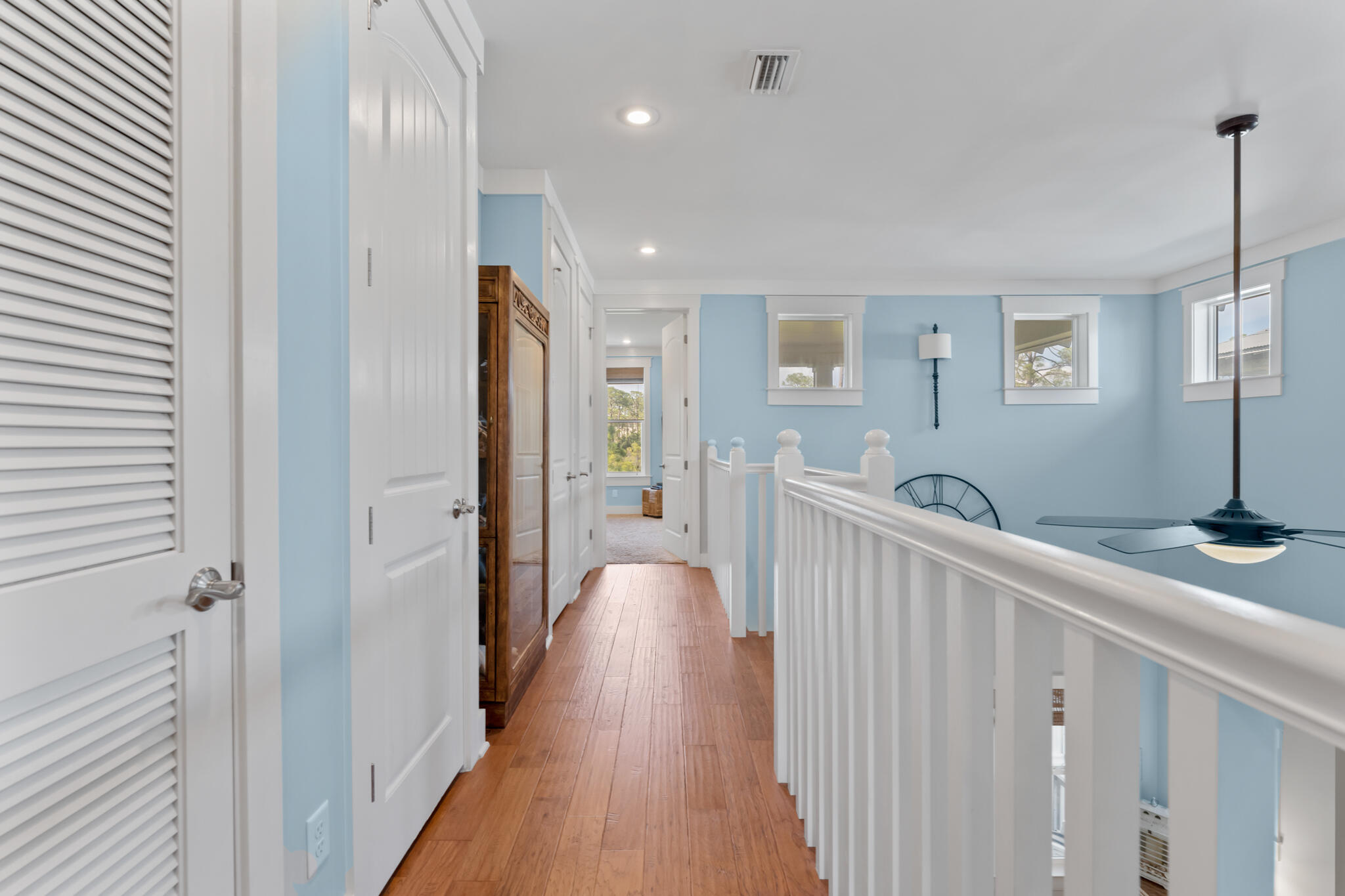 119 West Lifeguard Loop Inlet Beach Inlet Beach, FL 32461 - Photo 28 of 75 a view of a hallway with wooden floor and furniture