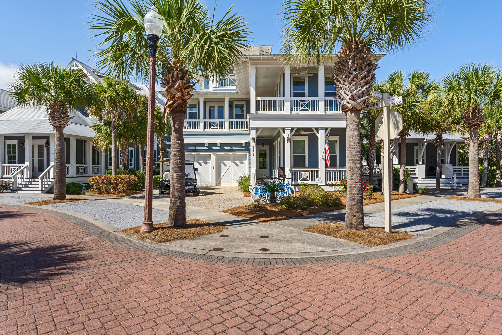 119 West Lifeguard Loop Inlet Beach Inlet Beach, FL 32461 - Photo 3 of 75 a front view of a house with a yard and palm trees