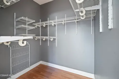 a view of a room with racks on the wall