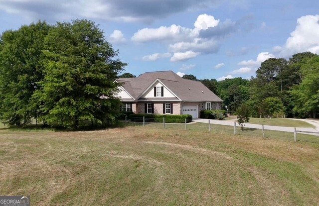 259 Hwy 11 Monroe, GA 30655 - Photo 1 of 19 a house with trees in the background
