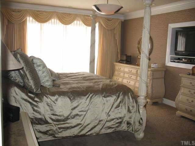 1608 Quaker Ridge Point Raleigh, NC 27615 - Photo 5 of 10 First floor master suite has view of golf course. Other