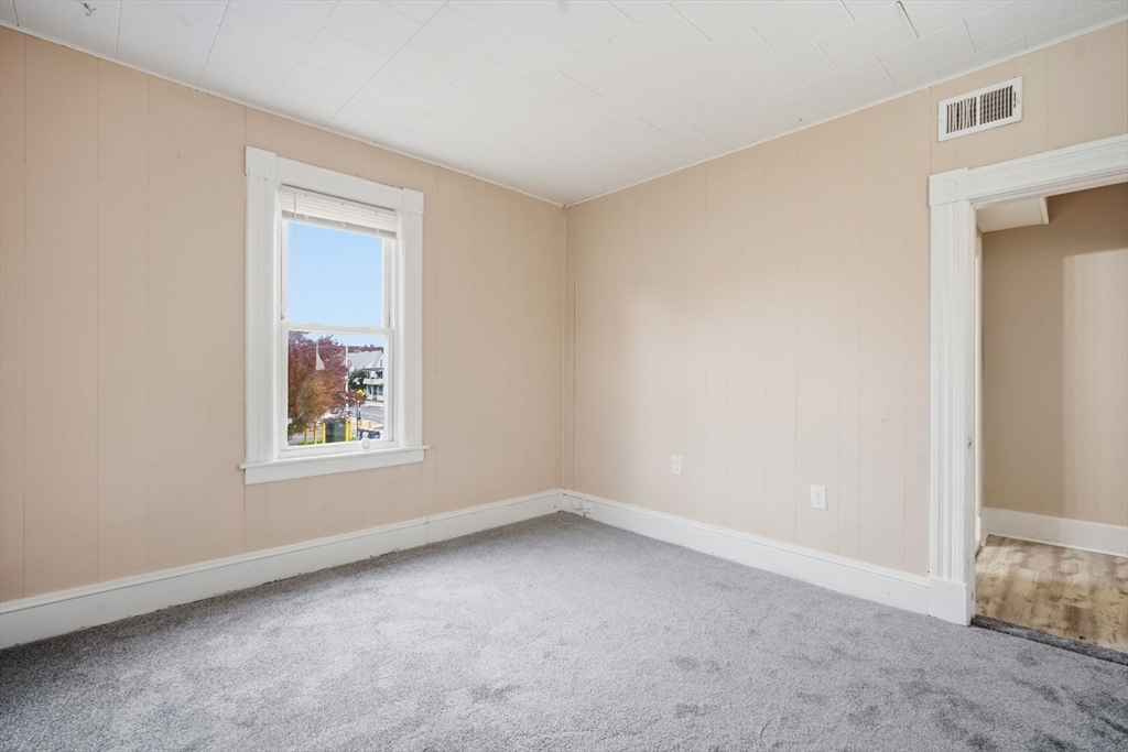 201 Main Street Springfield, MA 01108 - Photo 12 of 25 an empty room with a window