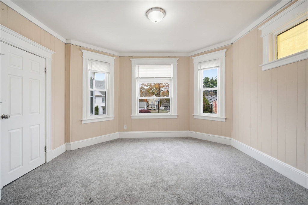201 Main Street Springfield, MA 01108 - Photo 18 of 25 a view of an empty room with a window