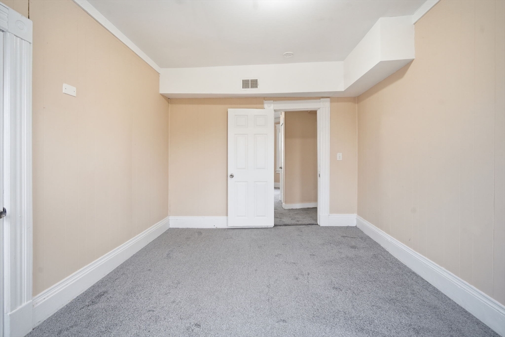 201 Main Street Springfield, MA 01108 - Photo 9 of 25 an empty room with a natural light