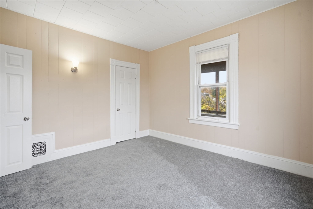 201 Main Street Springfield, MA 01108 - Photo 10 of 25 an empty room with windows and closet