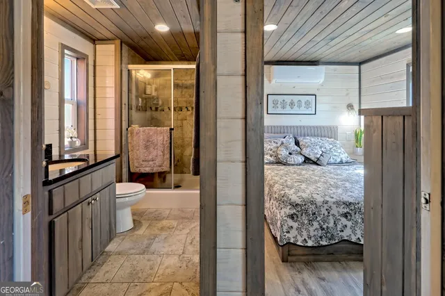 a kitchen with a refrigerator and a sink