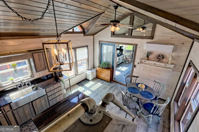 a backyard of a house with barbeque oven