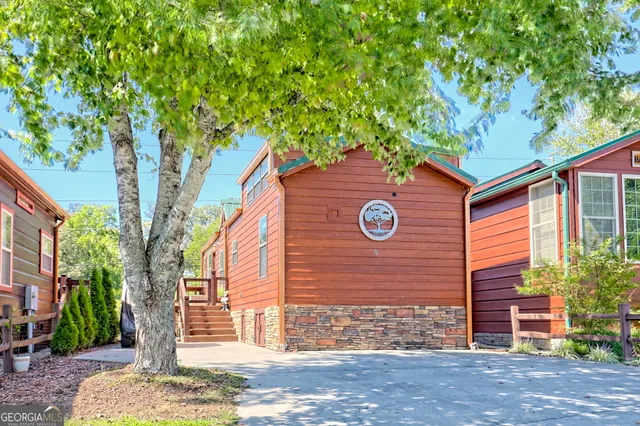 an aerial view of a house with a garden