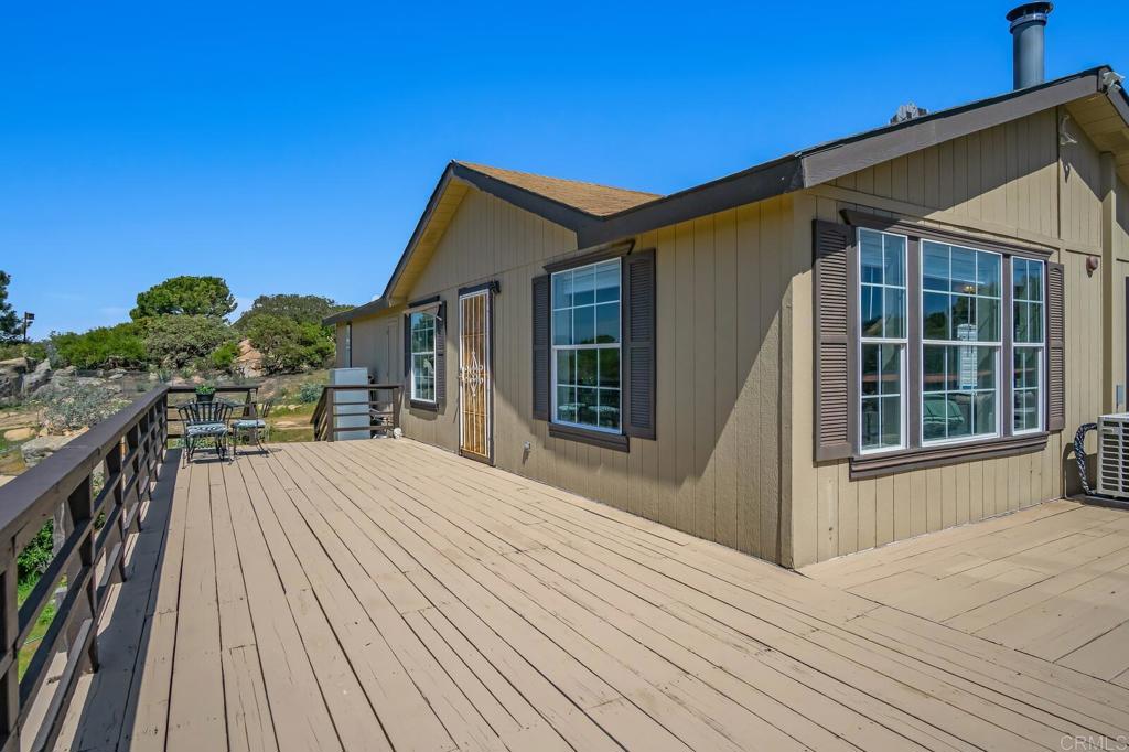 3465 Barrett View Road Alpine, CA 91901 - Photo 2 of 36 a view of a house with a roof deck