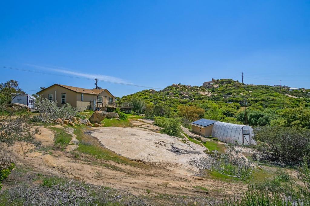 3465 Barrett View Road Alpine, CA 91901 - Photo 26 of 36 a view of a dry yard with a house
