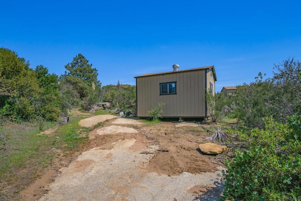 3465 Barrett View Road Alpine, CA 91901 - Photo 27 of 36 front view of a house with a yard