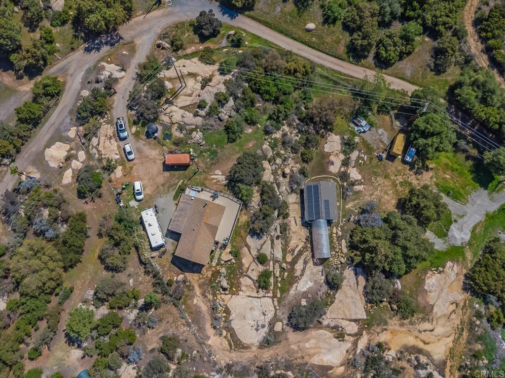 3465 Barrett View Road Alpine, CA 91901 - Photo 31 of 36 an aerial view of a house with a yard and trees