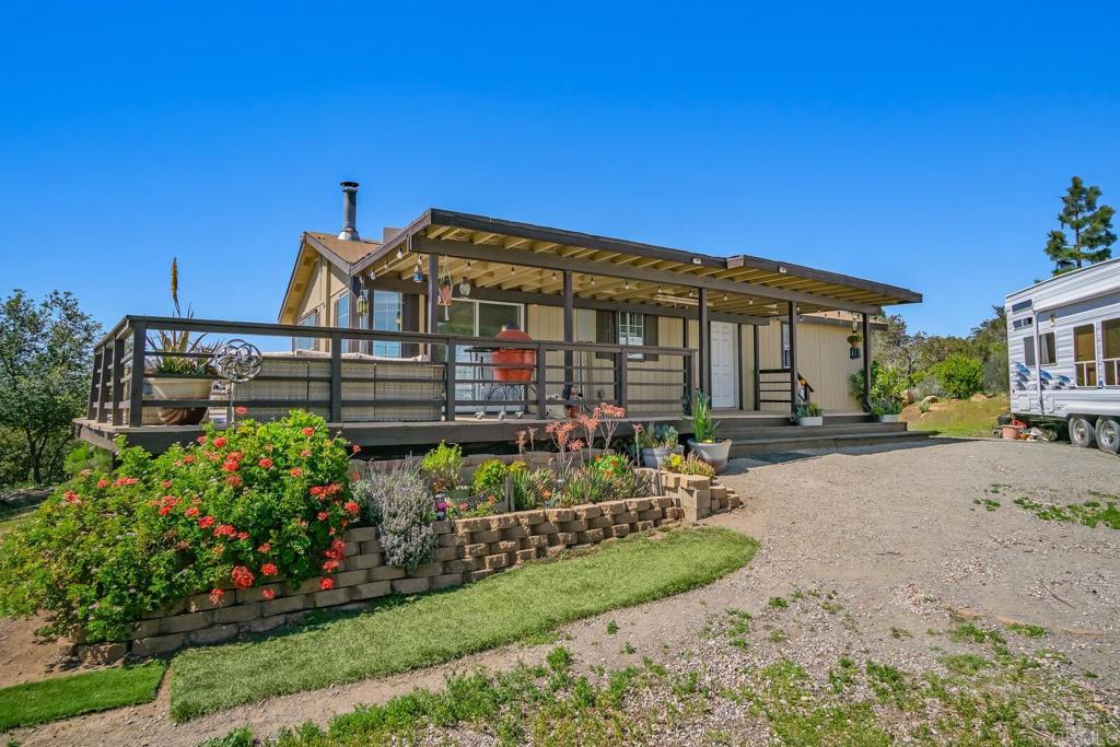 3465 Barrett View Road Alpine, CA 91901 - Photo 4 of 36 a view of a house with a yard and potted plants