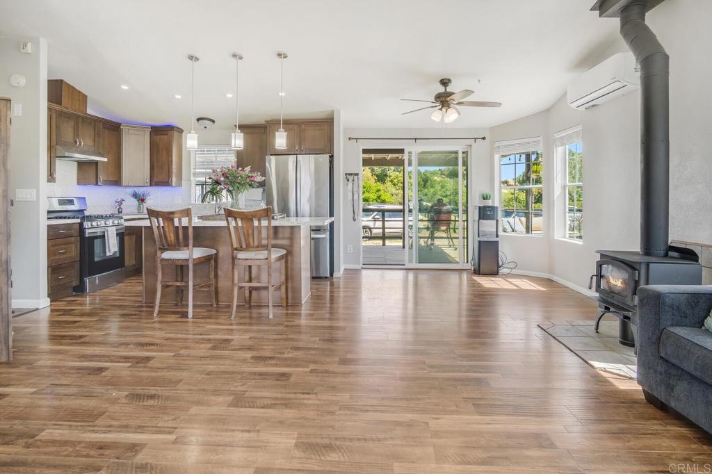 3465 Barrett View Road Alpine, CA 91901 - Photo 35 of 36 a view of a dining room with furniture window and wooden floor