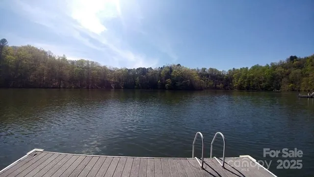 a view of a lake with mountain in the back