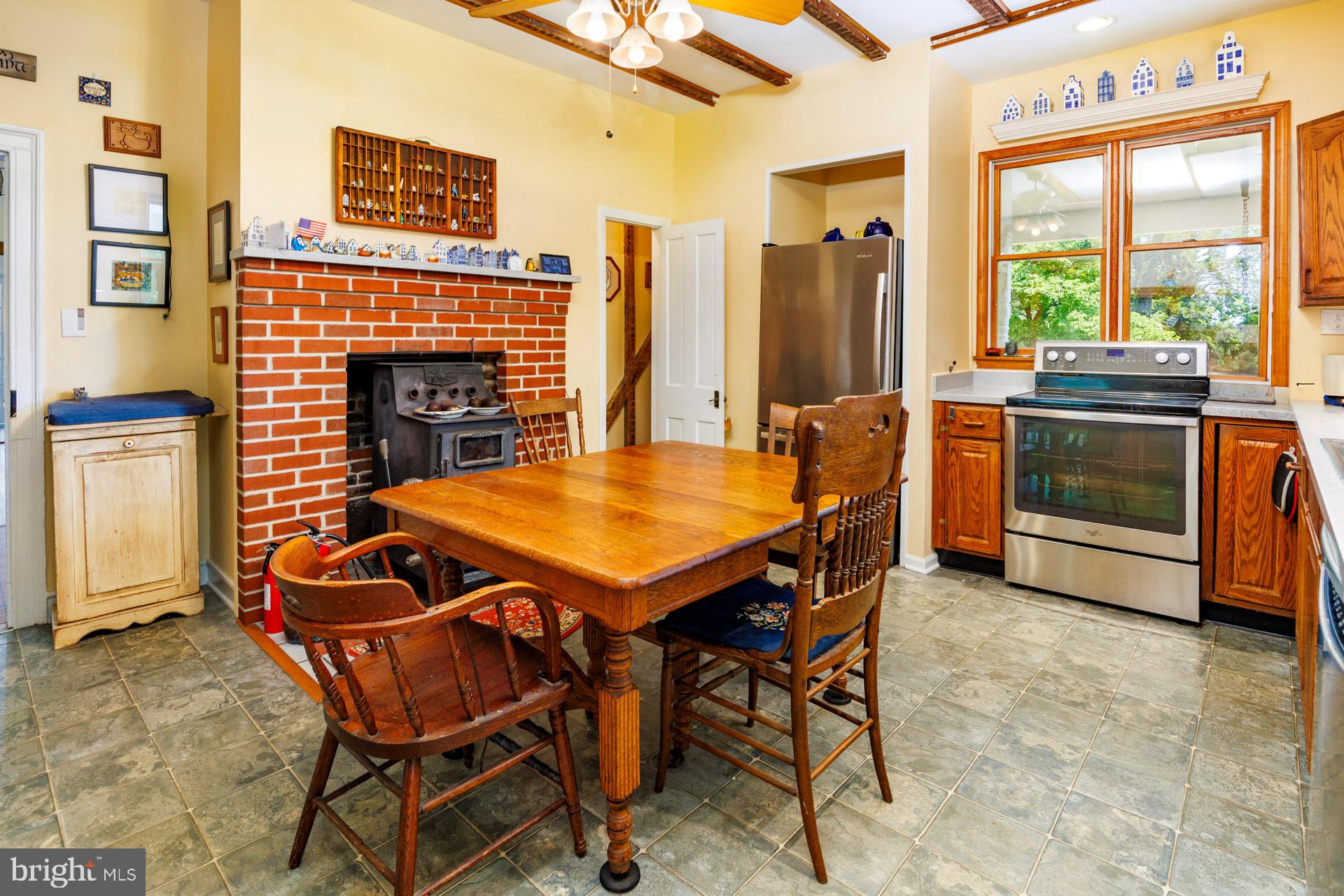 2208 Horns Point Road Cambridge, MD 21613 - Photo 28 of 61 a patio with a table and chairs