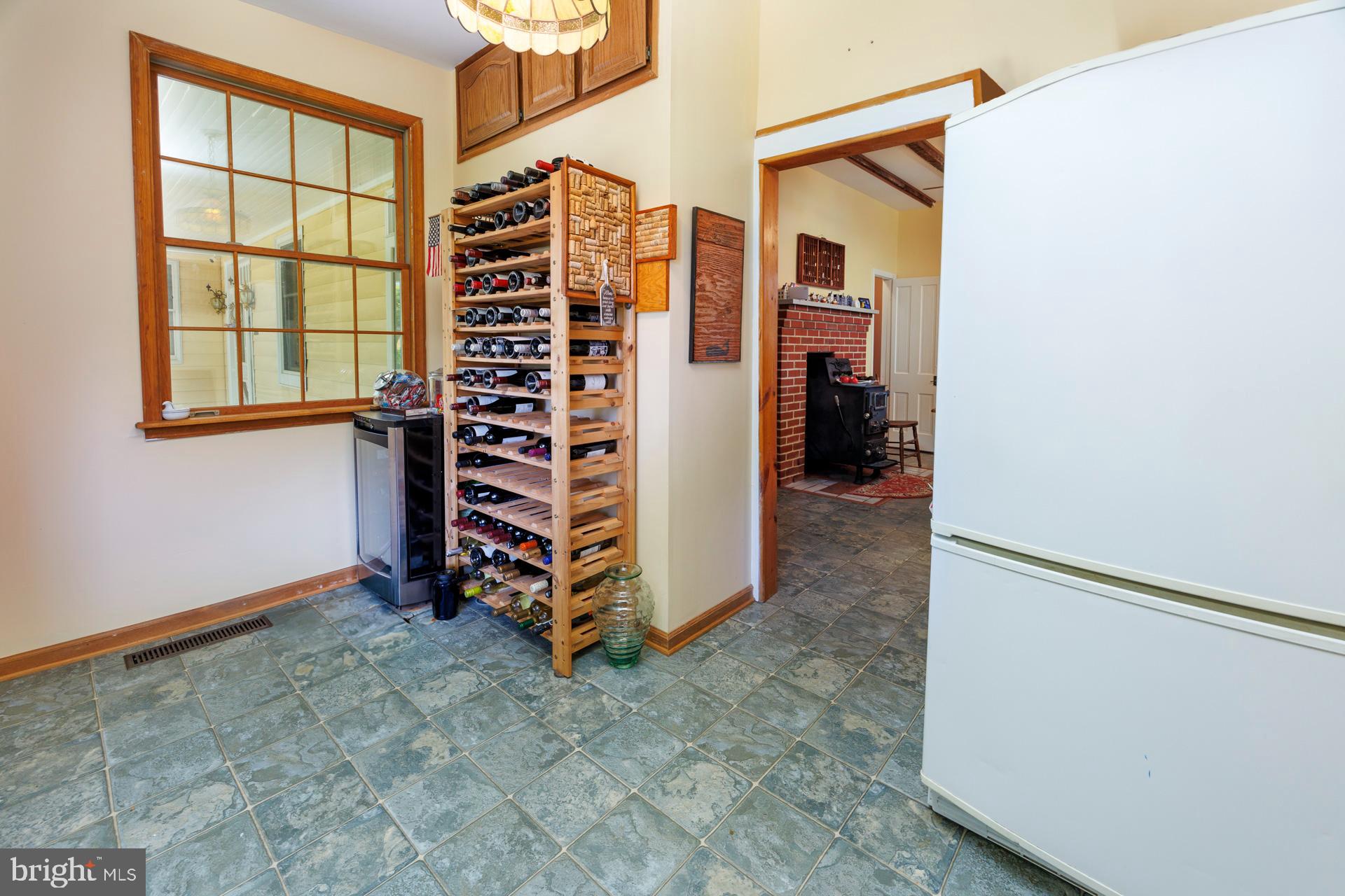 2208 Horns Point Road Cambridge, MD 21613 - Photo 33 of 61 Pantry w/Wine Rack and Extra Freezer