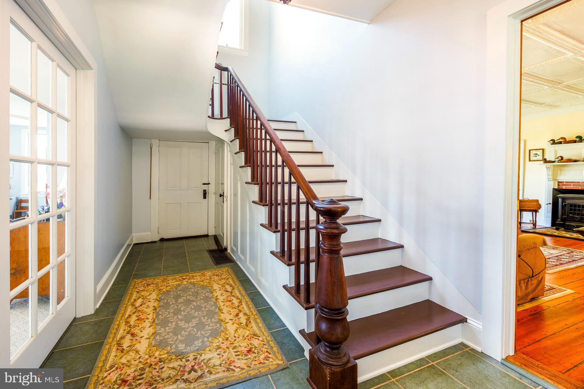 2208 Horns Point Road Cambridge, MD 21613 - Photo 35 of 61 Front Foyer Stair View