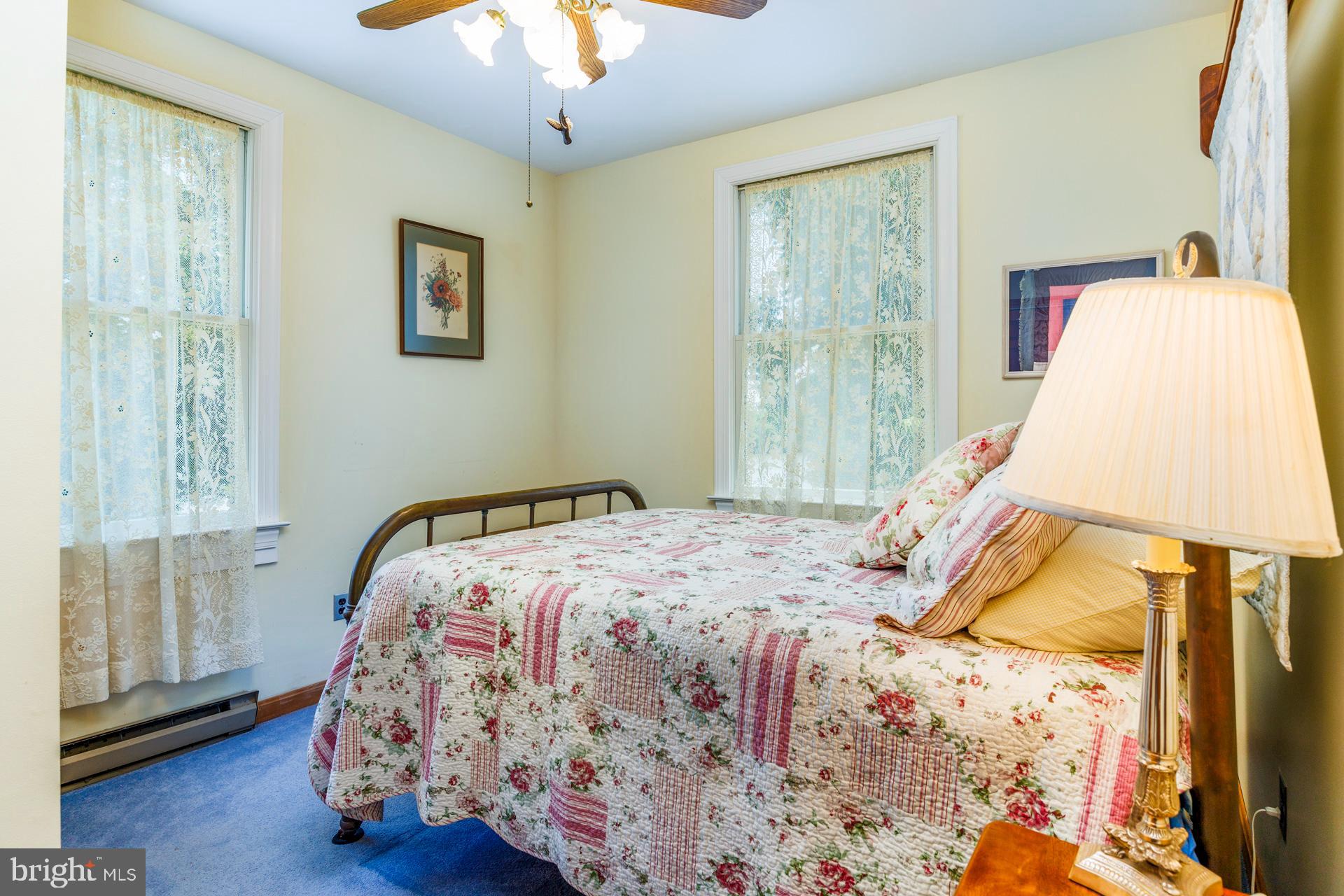 2208 Horns Point Road Cambridge, MD 21613 - Photo 44 of 61 a bedroom with a bed and a window