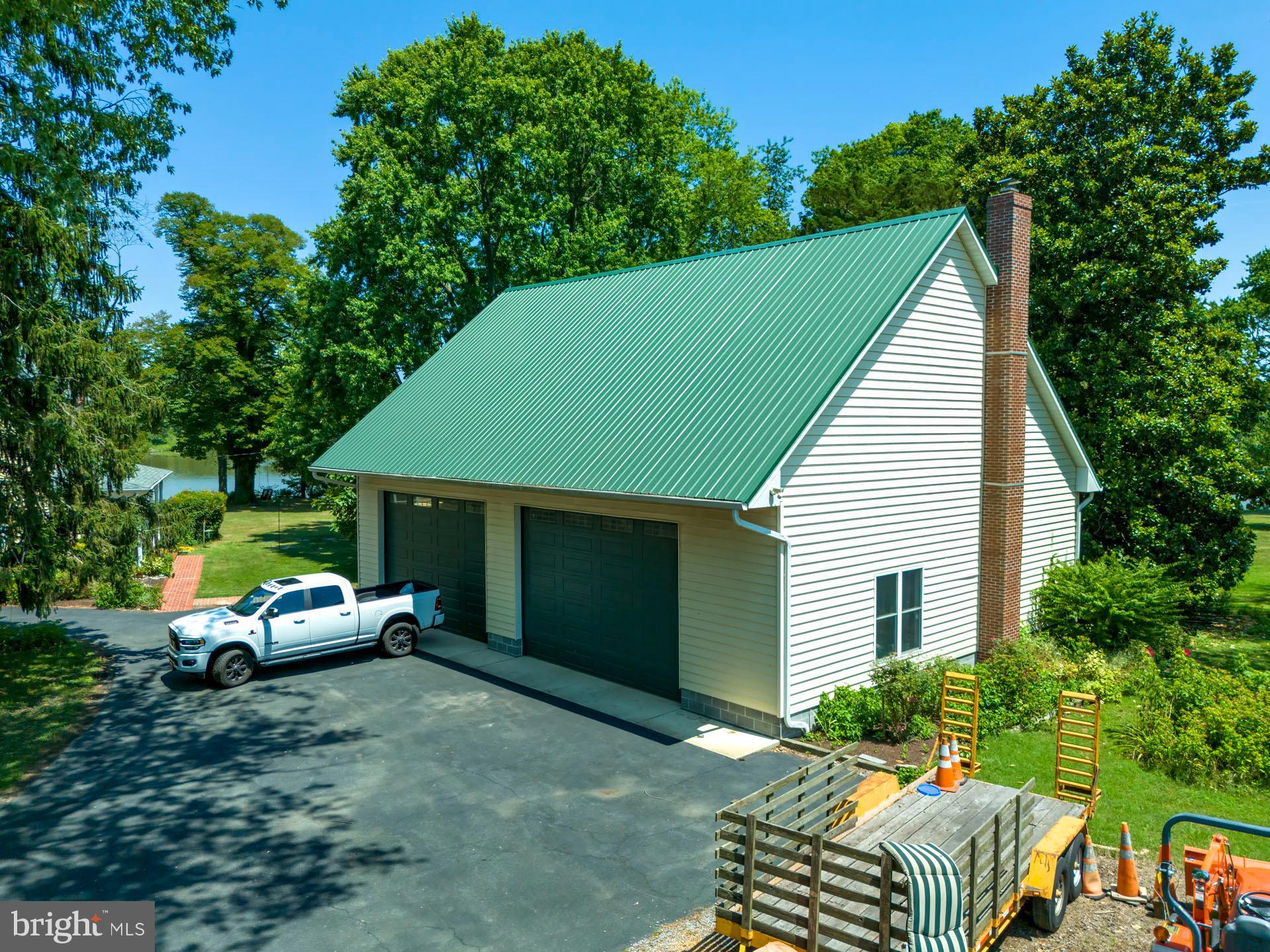 2208 Horns Point Road Cambridge, MD 21613 - Photo 51 of 61 a house view with a garden space