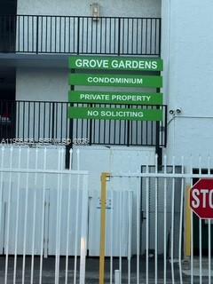 2460 Southwest 18th Avenue, Unit 1211 Miami, FL 33133 - Photo 13 of 15 a view of a wooden fence