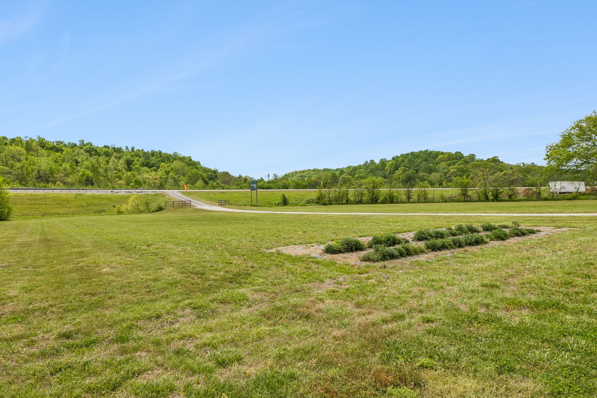 2461 Bodenham Road Pulaski, TN 38478 - Photo 55 of 100 a view of a lake with houses in background