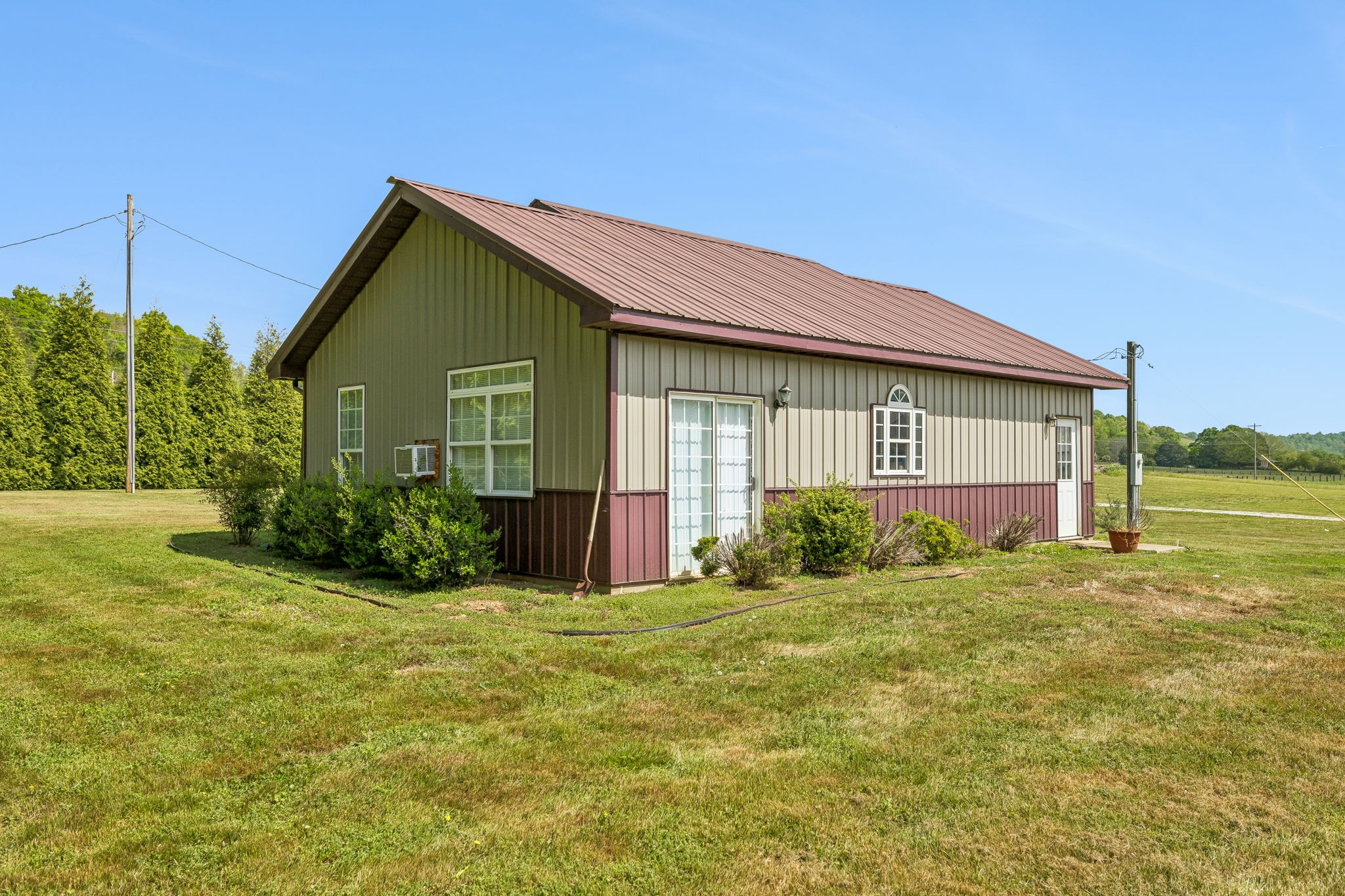 2461 Bodenham Road Pulaski, TN 38478 - Photo 6 of 100 a view of a house with backyard and garden