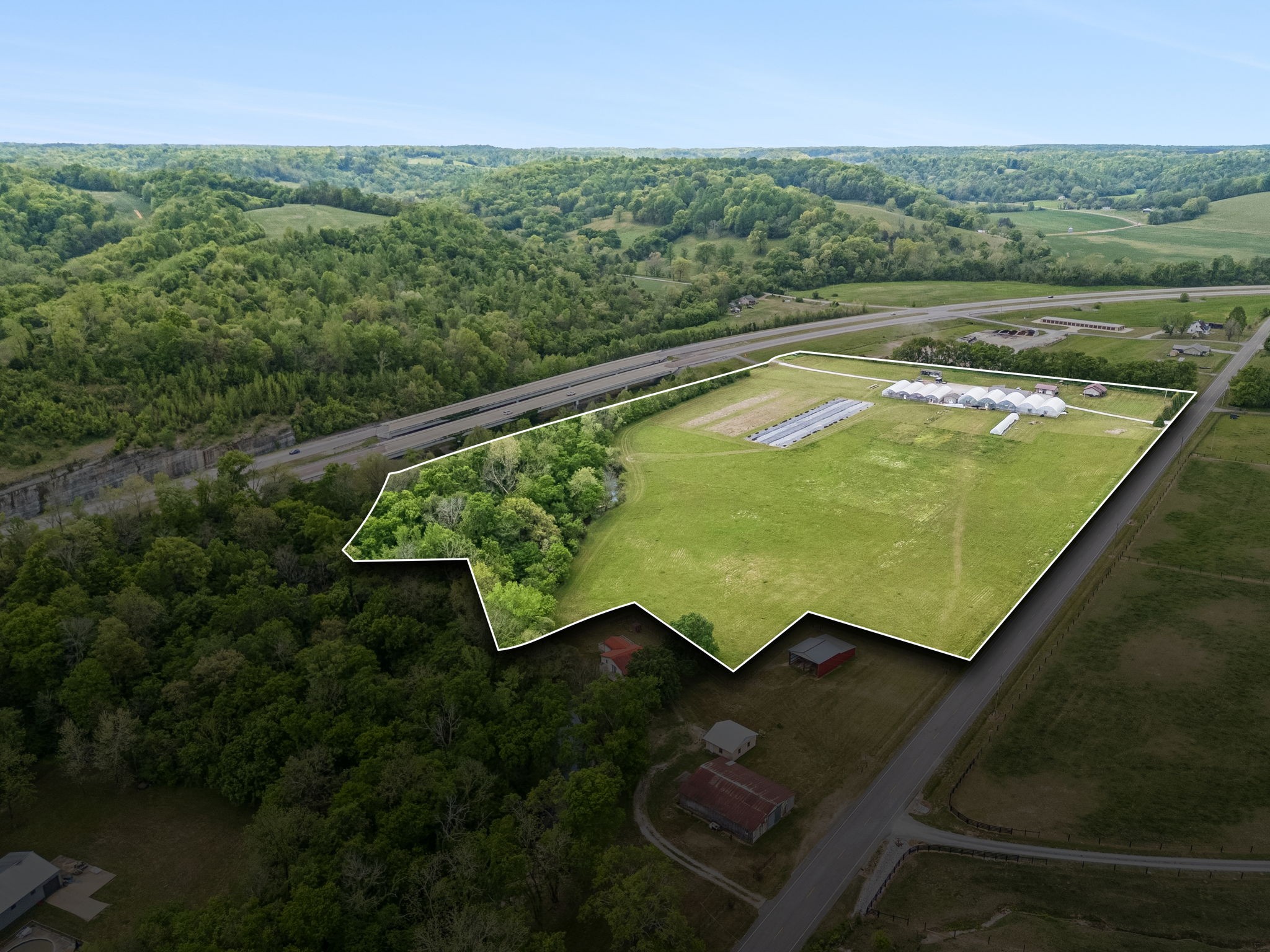 2461 Bodenham Road Pulaski, TN 38478 - Photo 68 of 100 a view of a swimming pool with a yard