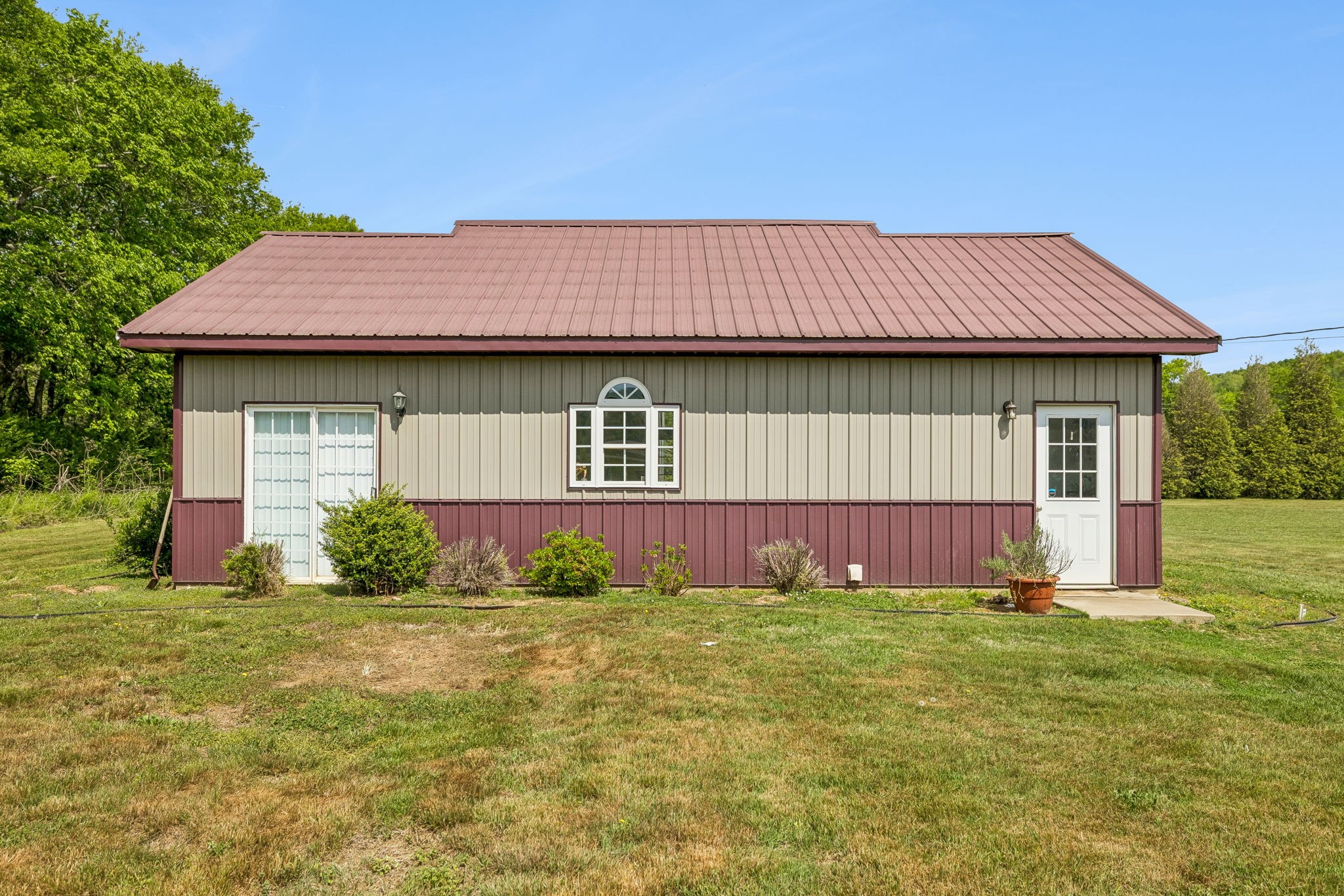 2461 Bodenham Road Pulaski, TN 38478 - Photo 7 of 100 a view of a house with garden