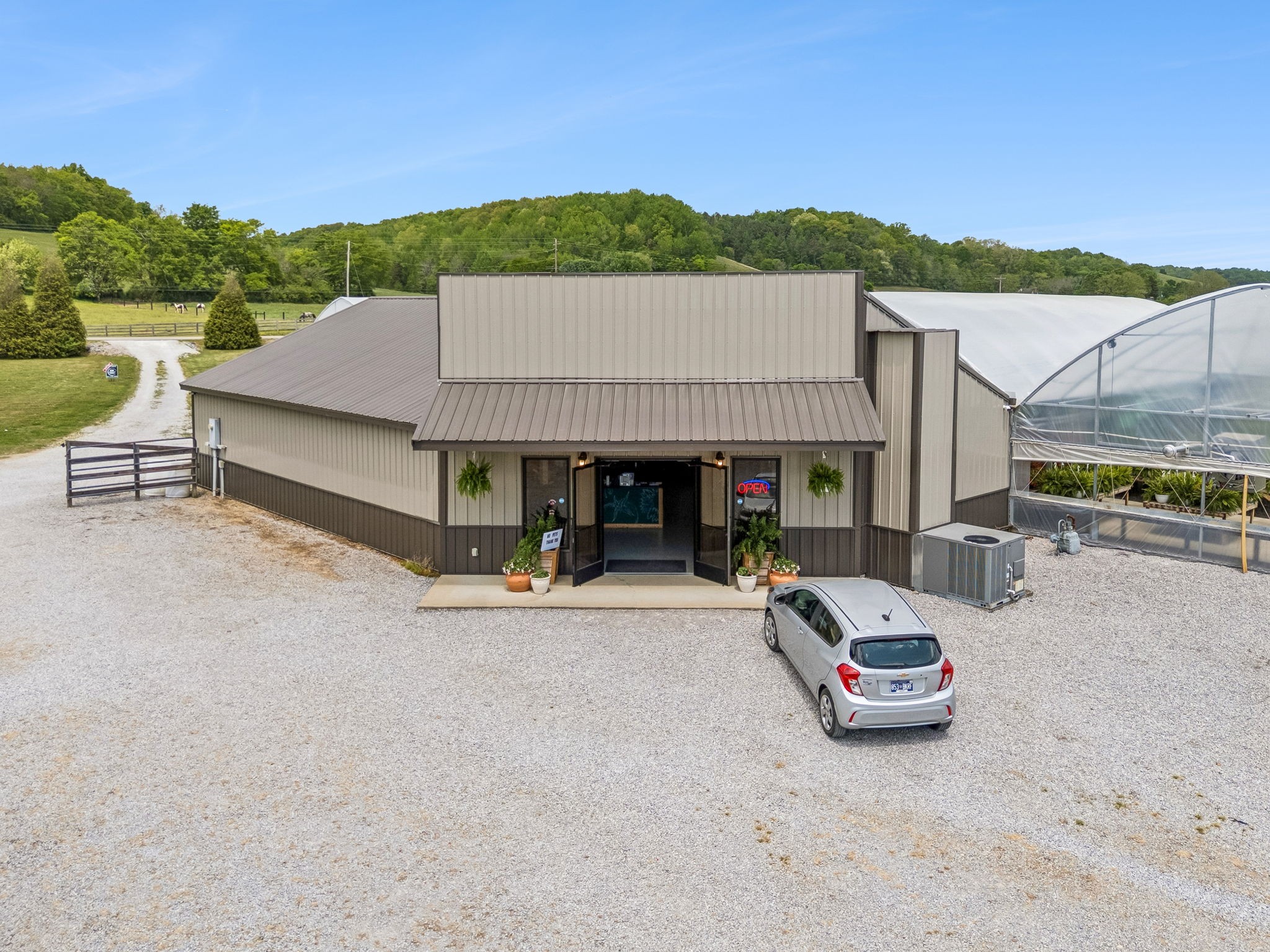 2461 Bodenham Road Pulaski, TN 38478 - Photo 71 of 100 a view of a house with pool porch and sitting area