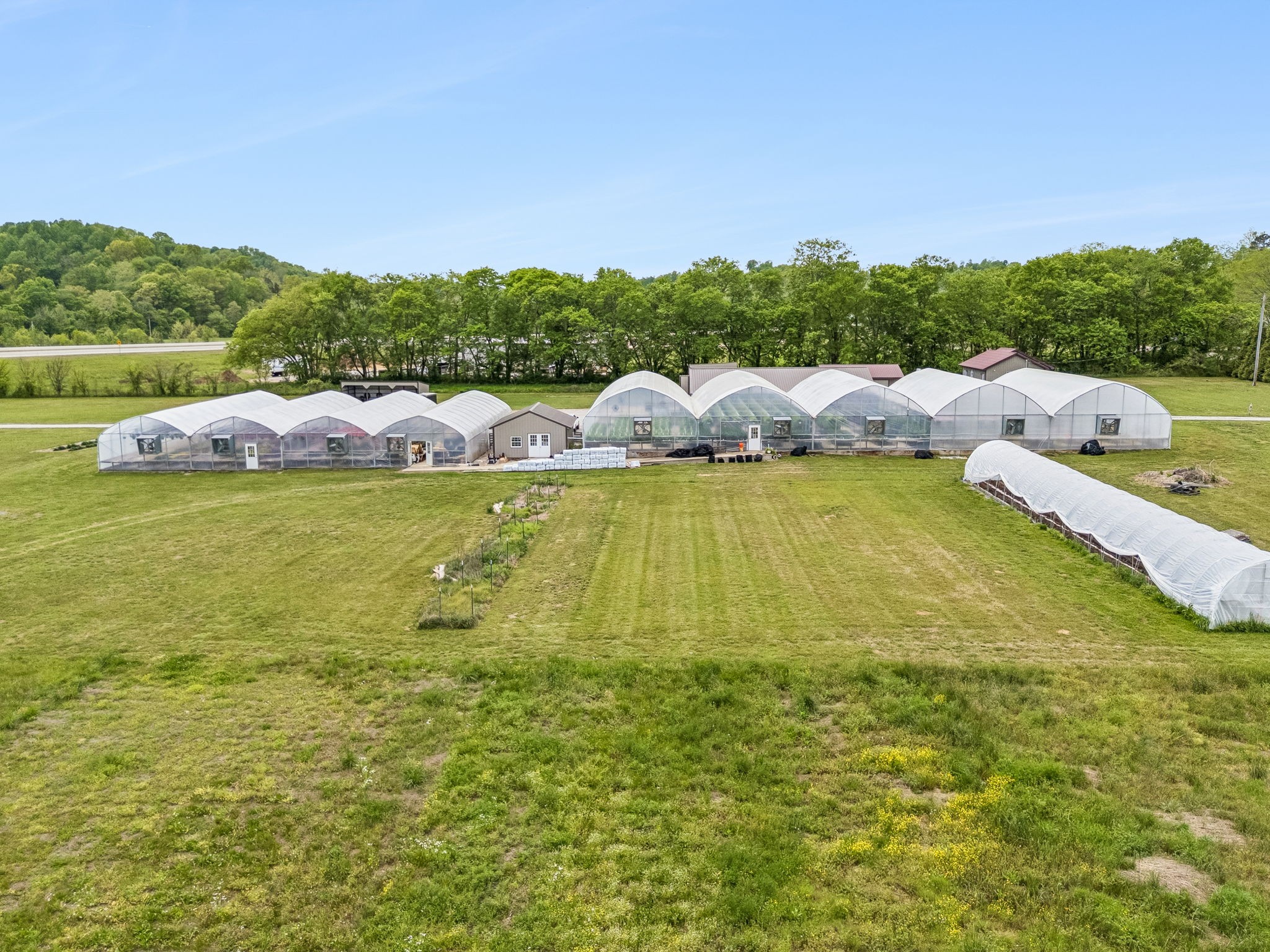 2461 Bodenham Road Pulaski, TN 38478 - Photo 75 of 100 a view of a lake with houses in the back