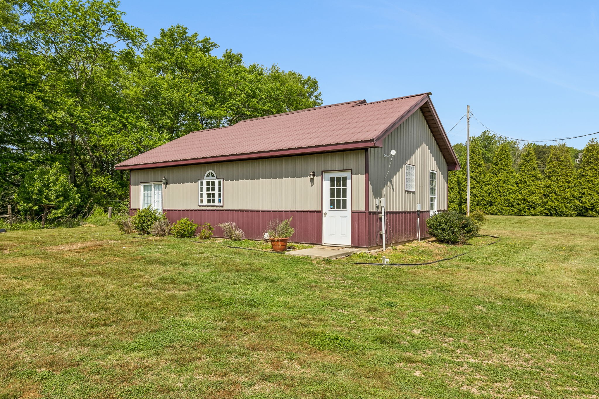 2461 Bodenham Road Pulaski, TN 38478 - Photo 8 of 100 a view of a house with a yard