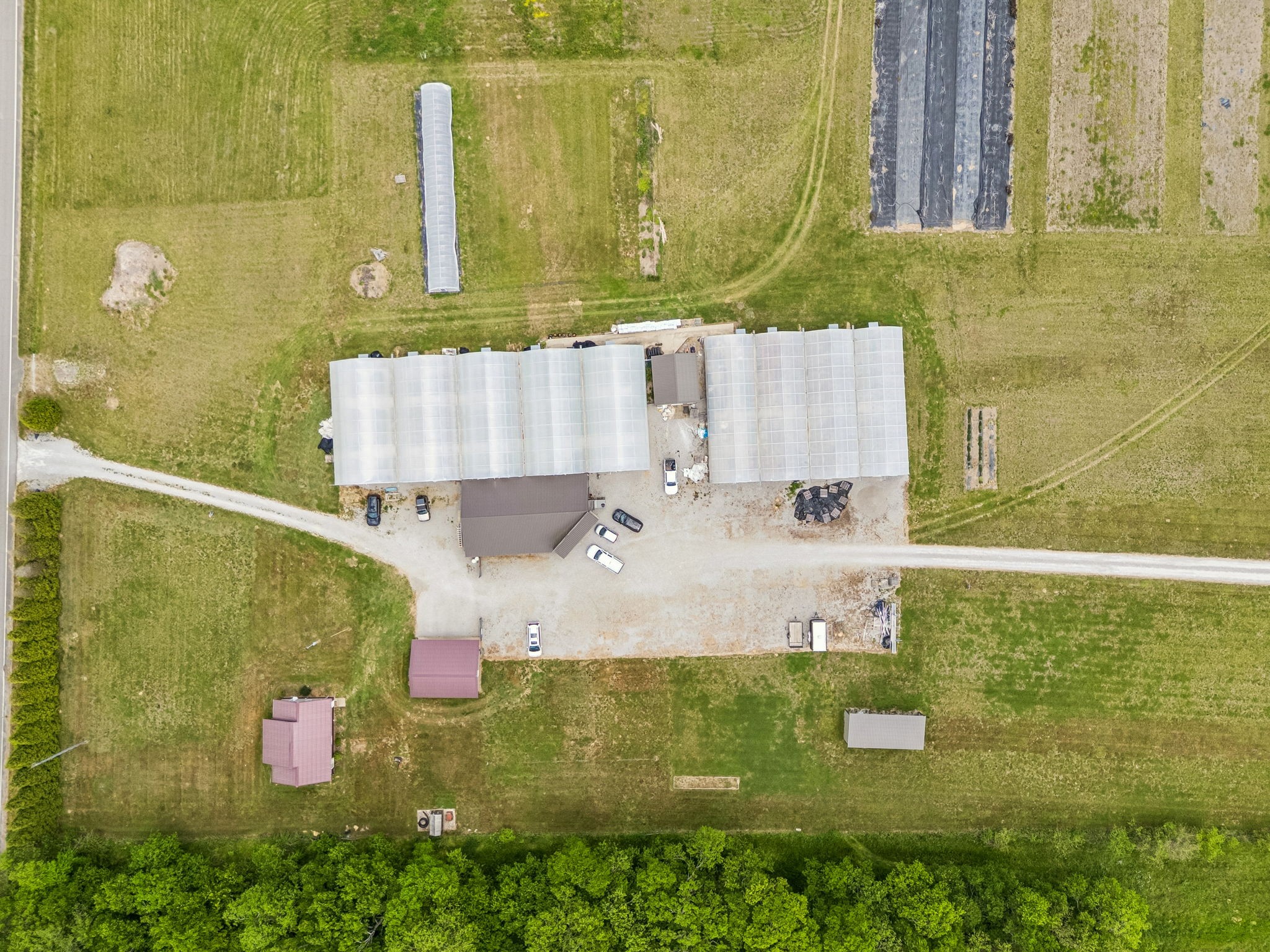 2461 Bodenham Road Pulaski, TN 38478 - Photo 83 of 100 with aerial view of residential house with pool and yard