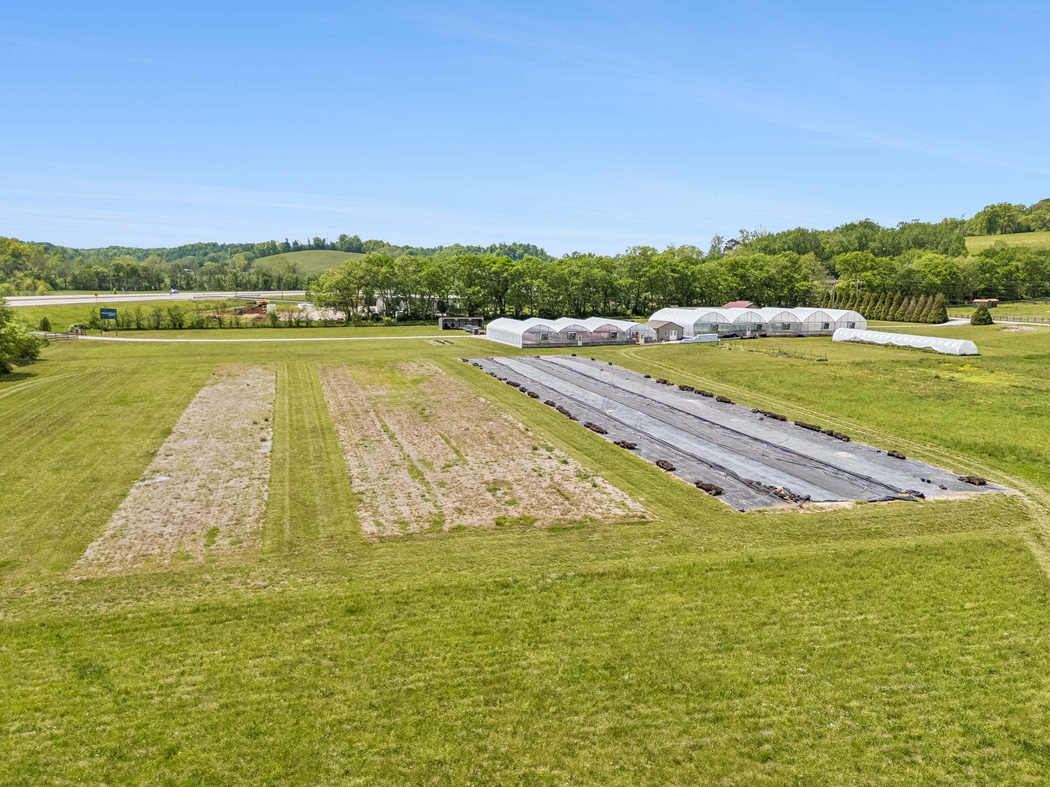 2461 Bodenham Road Pulaski, TN 38478 - Photo 99 of 100 a view of a lake with a big yard
