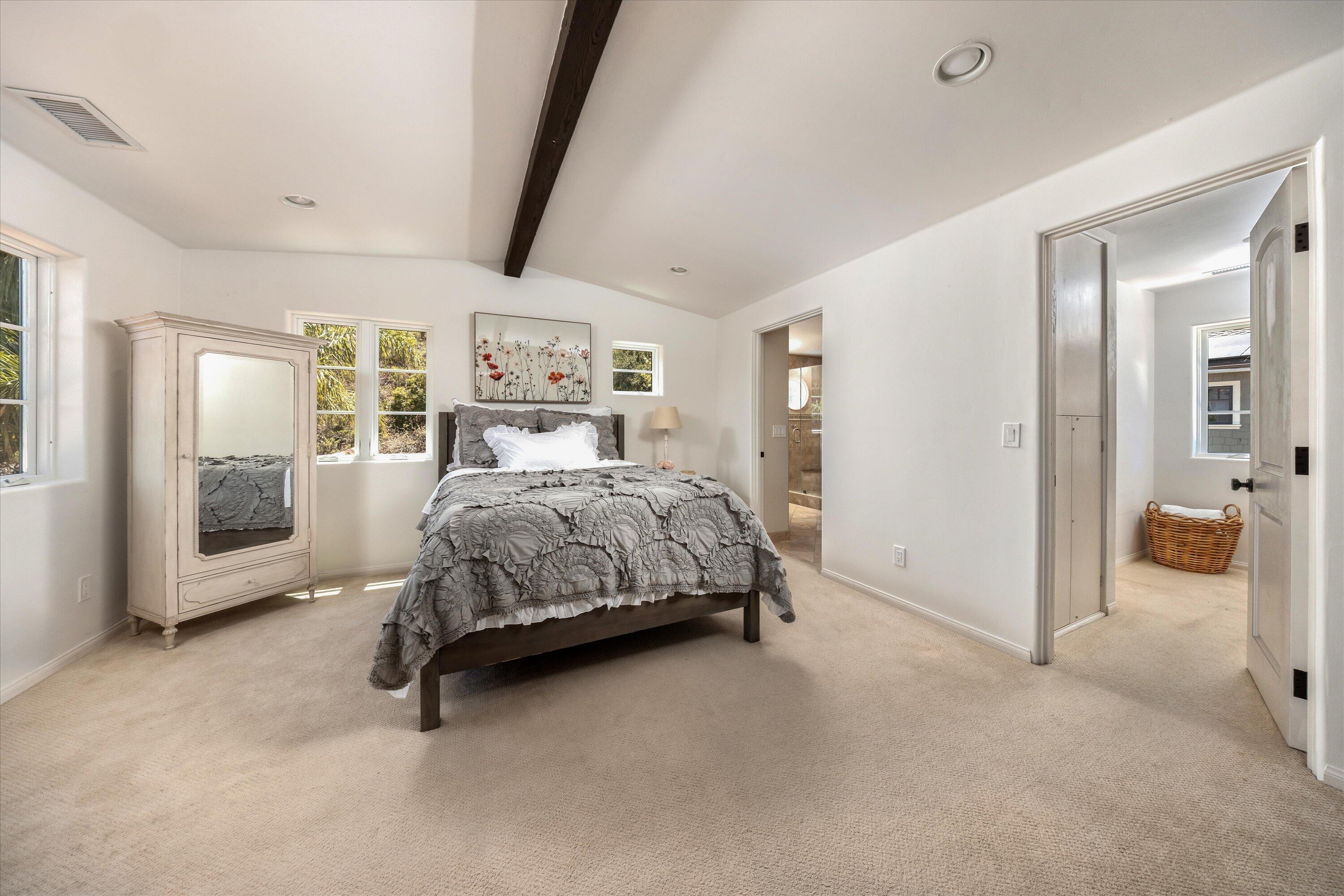 333 Conejo Road Santa Barbara, CA 93103 - Photo 22 of 43 a bedroom with a bed and a view of bathroom