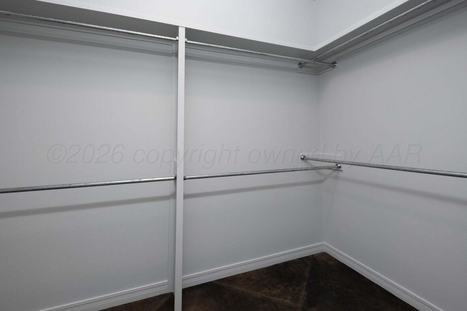 10311 Ruse Street Amarillo, TX 79118 - Photo 16 of 29 a view of a room with racks on the wall
