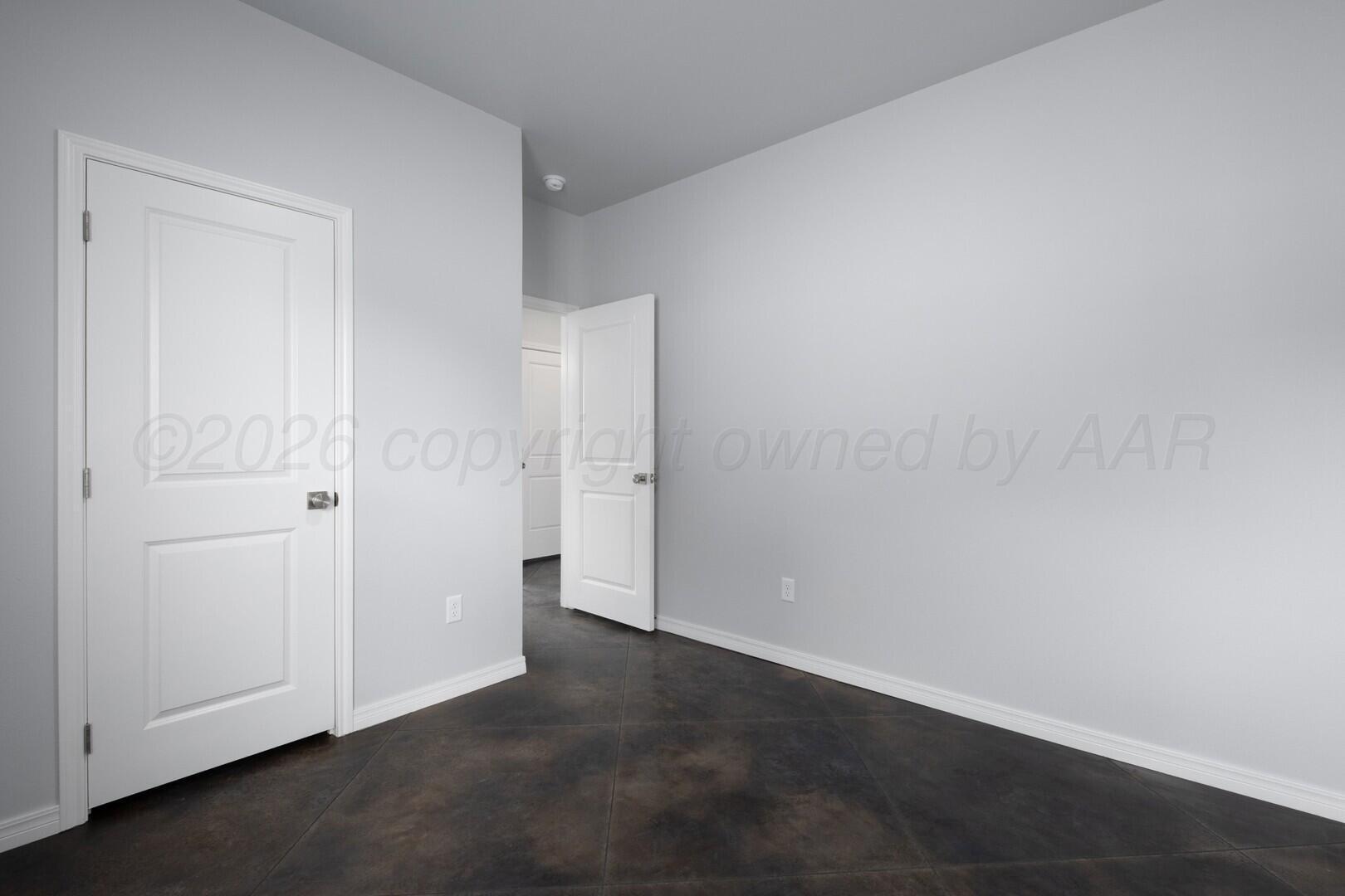 10311 Ruse Street Amarillo, TX 79118 - Photo 22 of 29 an empty room with closet area