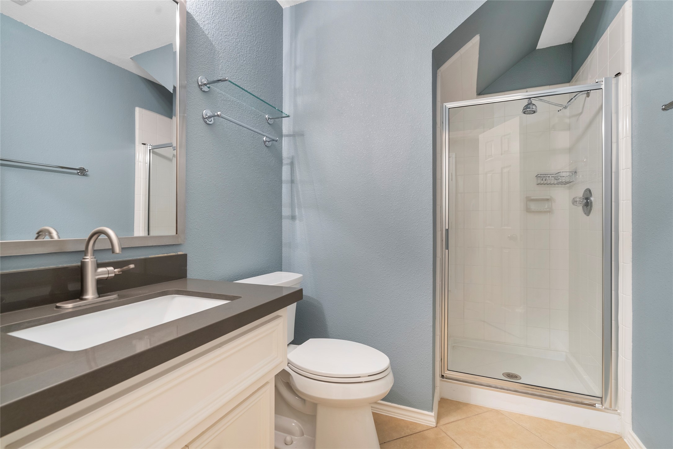 5239 Schuler Street, Unit C Houston, TX 77007 - Photo 3 of 16 a bathroom with a sink toilet and shower