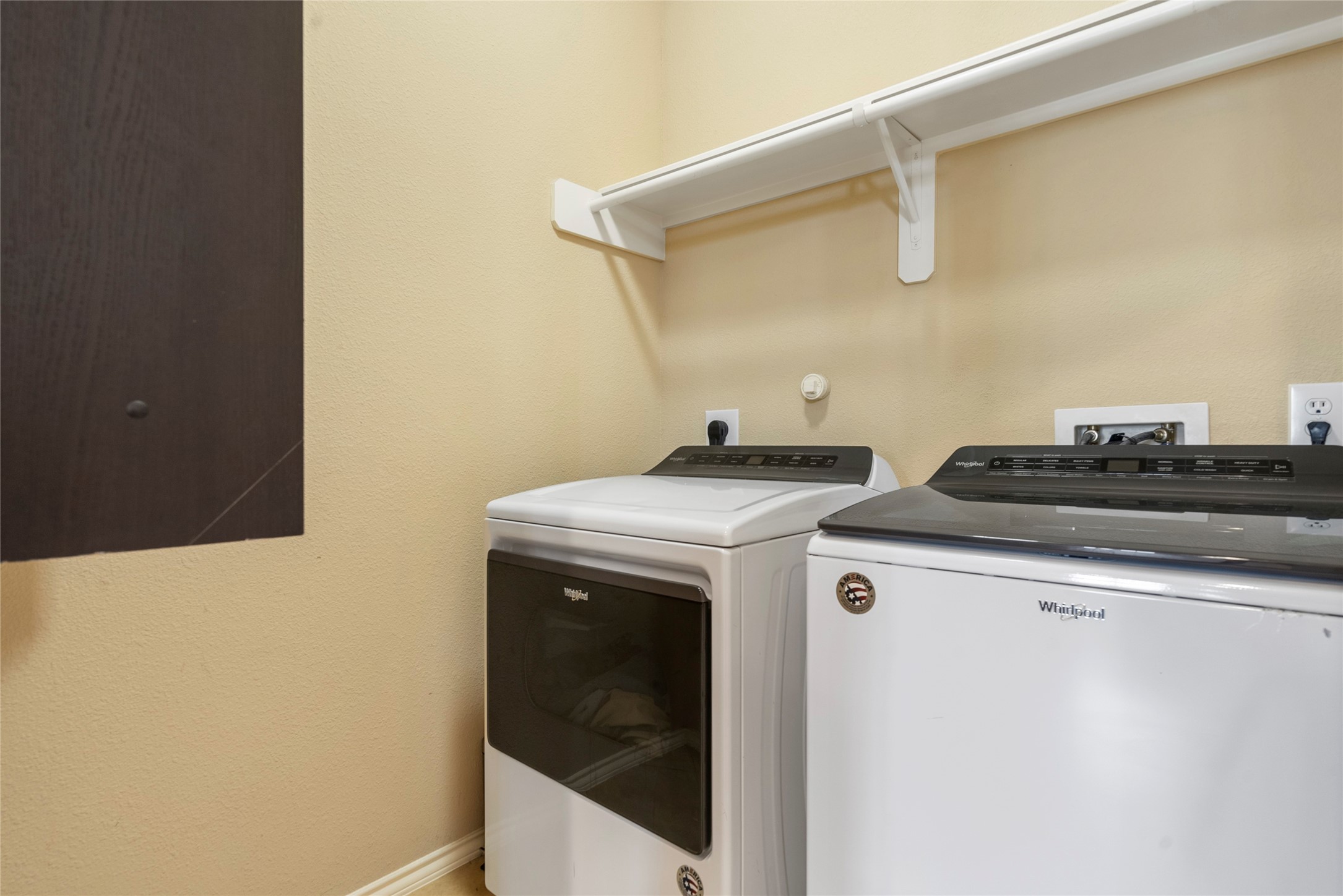 5239 Schuler Street, Unit C Houston, TX 77007 - Photo 7 of 16 a utility room with dryer and washer
