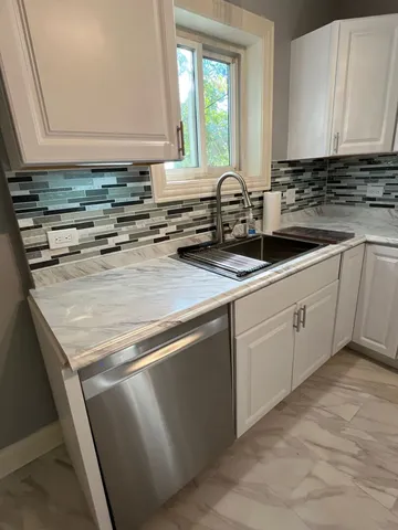 $240,000 | 7438 South Champlain Avenue, Chicago, IL 60619