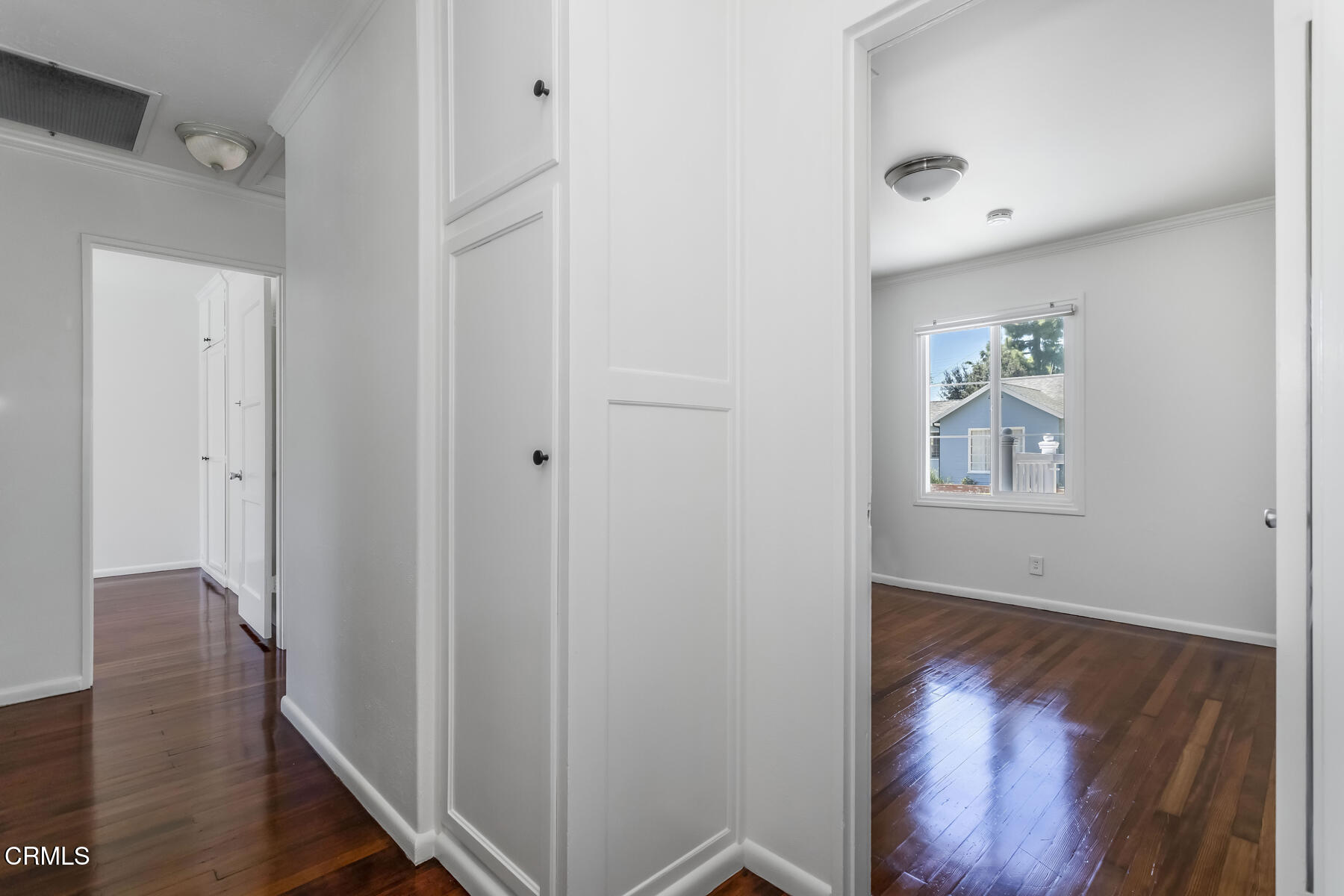 1338 Brixton Road Pasadena, CA 91105 - Photo 16 of 43 a view of a hallway with wooden floor