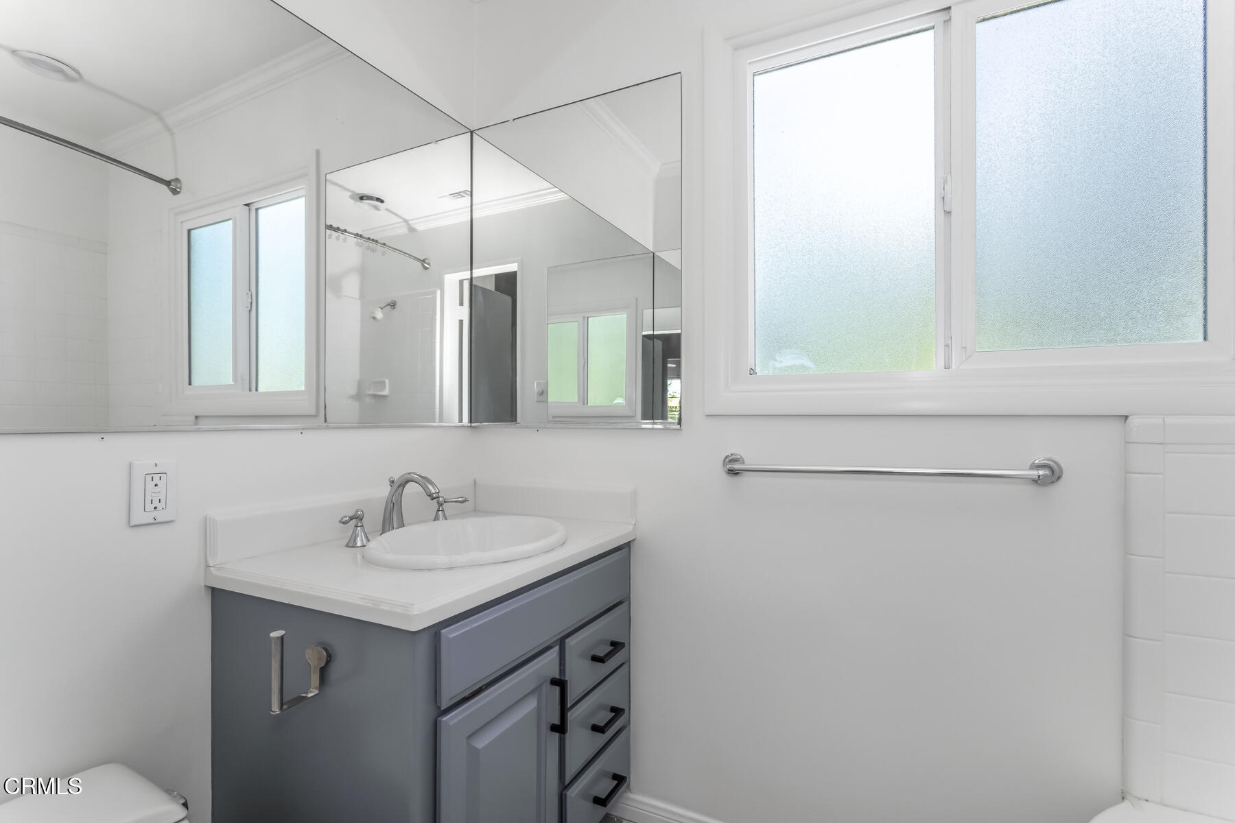 1338 Brixton Road Pasadena, CA 91105 - Photo 24 of 43 a bathroom with a sink and a mirror