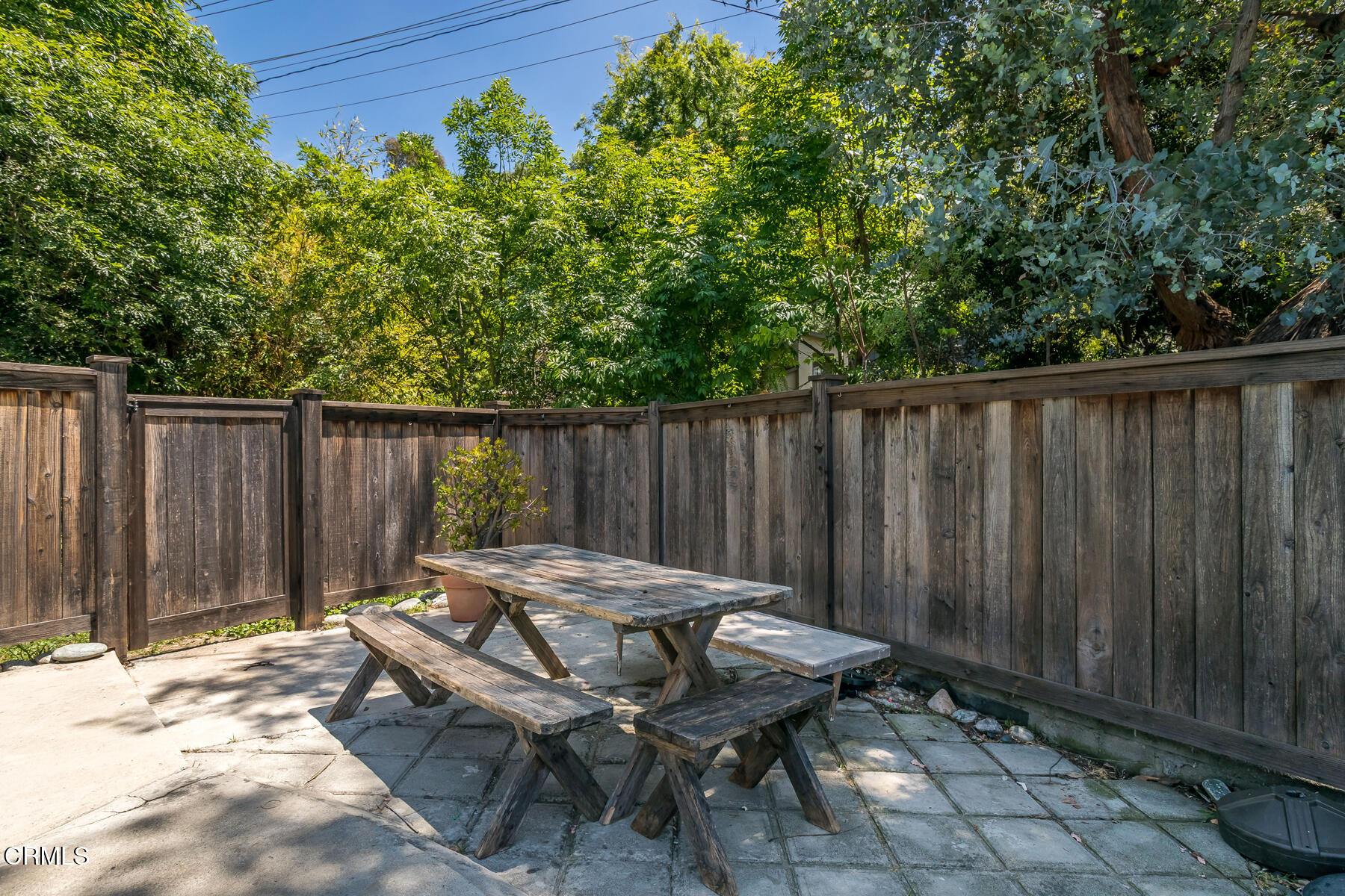 1338 Brixton Road Pasadena, CA 91105 - Photo 39 of 43 a backyard of a house with table and chairs