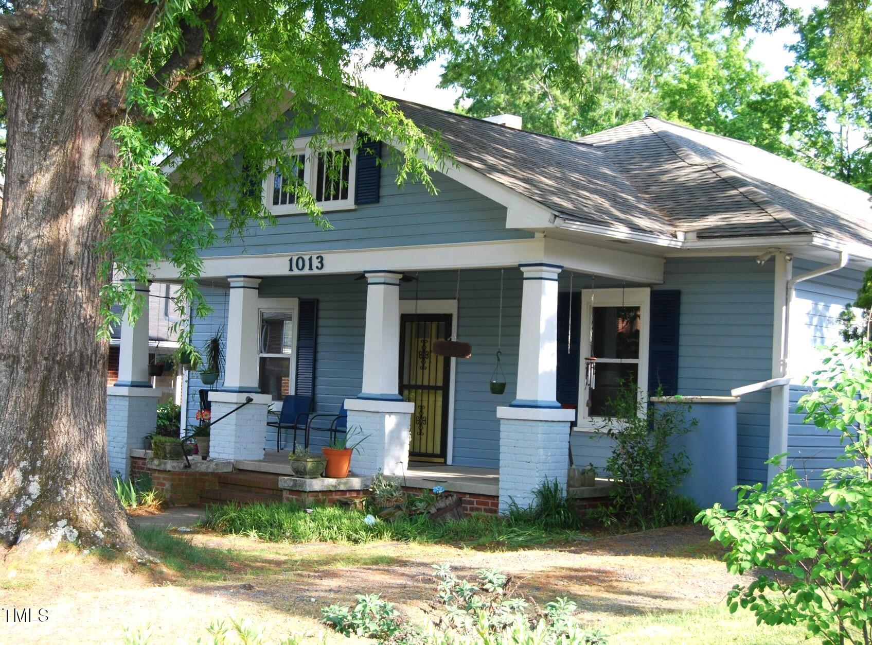 1013 Green Street Durham, NC 27701 - Photo 1 of 32 a front view of a house with garden