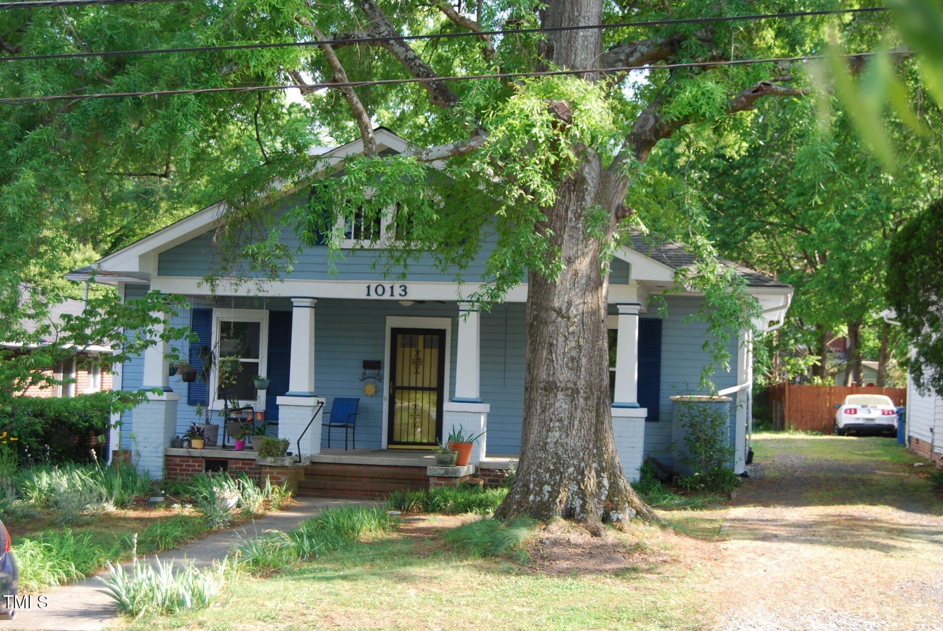 1013 Green Street Durham, NC 27701 - Photo 20 of 32 a front view of a house with garden