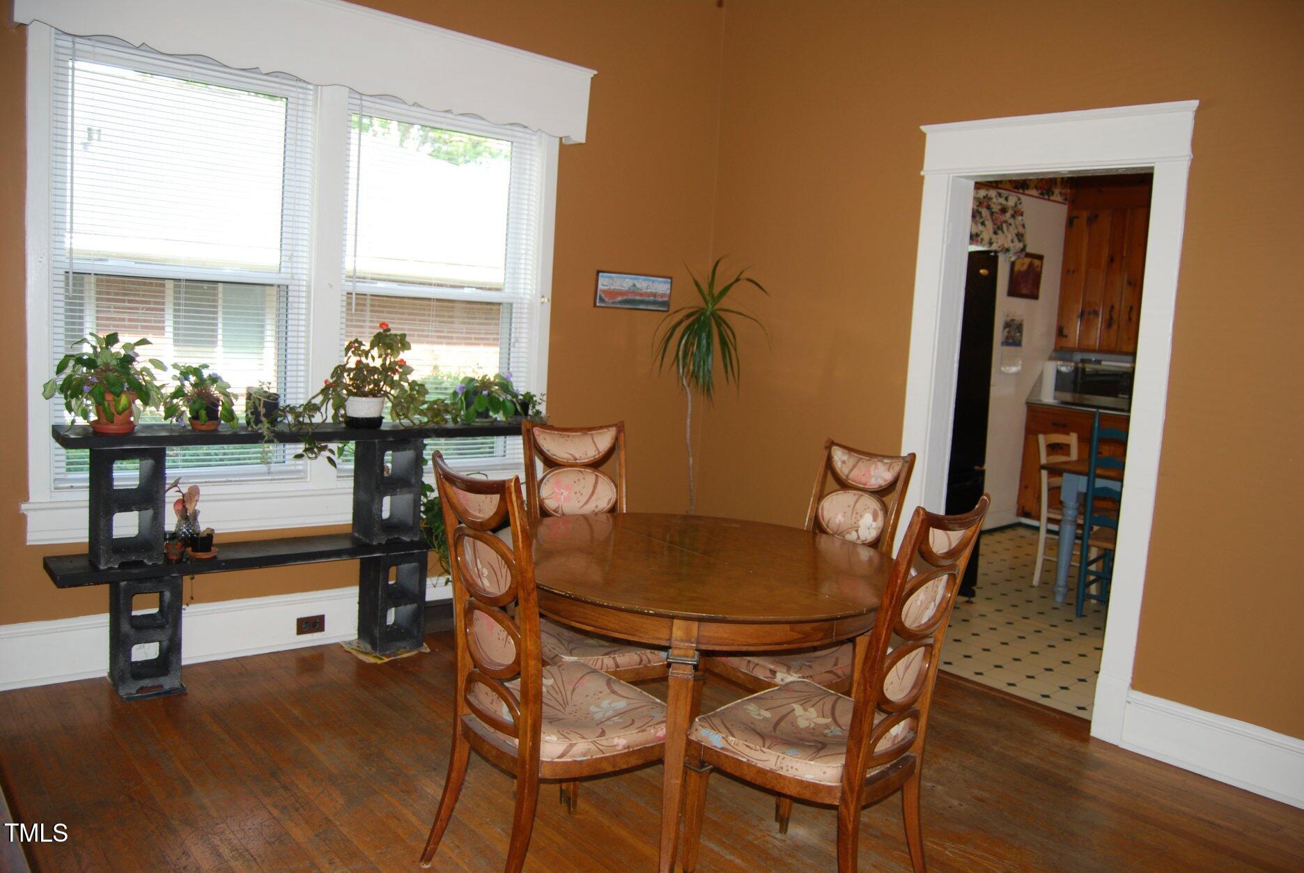 1013 Green Street Durham, NC 27701 - Photo 3 of 32 a dining room with furniture and window