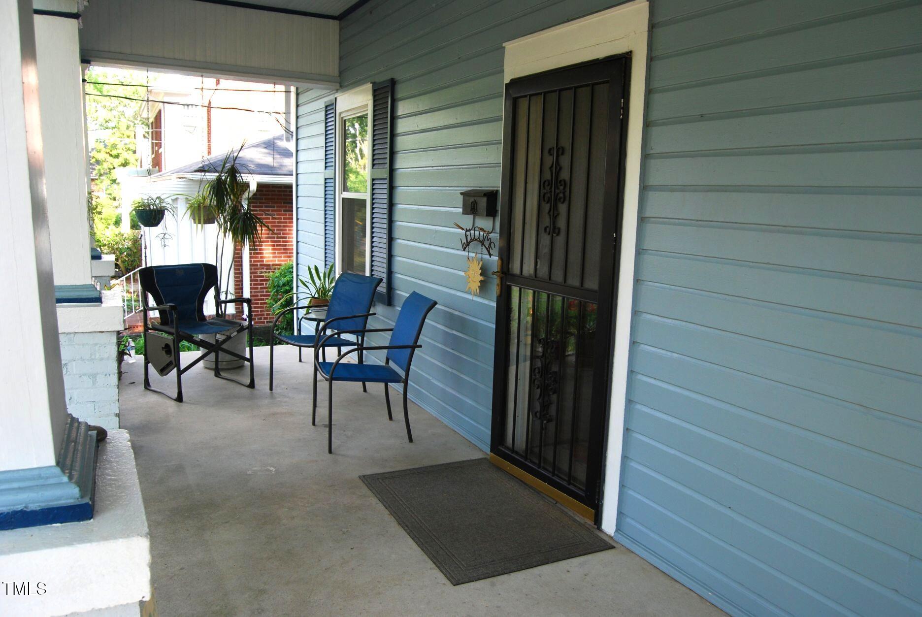 1013 Green Street Durham, NC 27701 - Photo 31 of 32 a view of balcony with chairs and potted plant