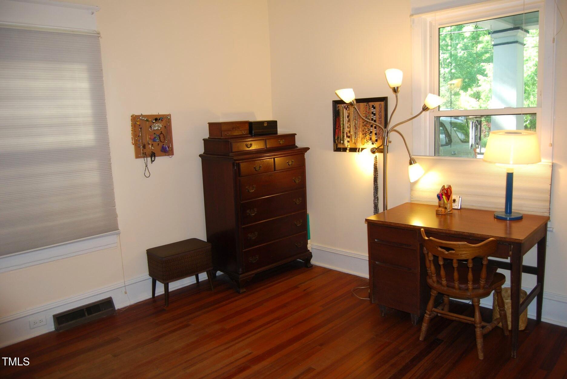 1013 Green Street Durham, NC 27701 - Photo 4 of 32 a dining room with furniture and wooden floor