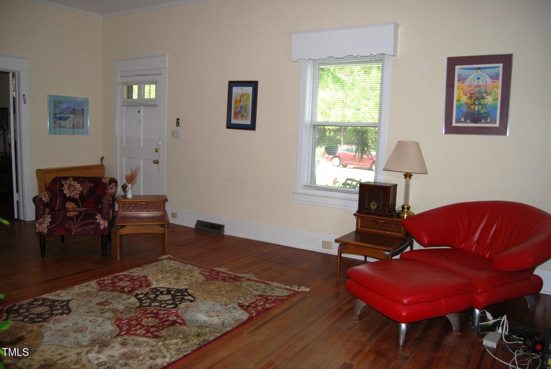 1013 Green Street Durham, NC 27701 - Photo 6 of 32 a living room with furniture rug and window