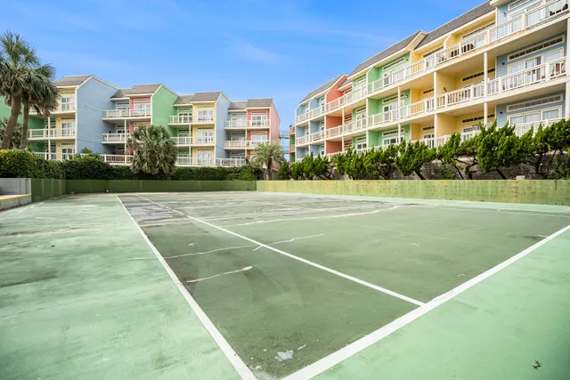 a view of a swimming pool with a patio